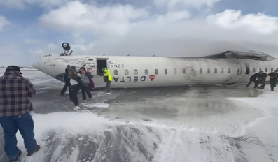 All passengers survive crash landing as plane flips at Toronto airport